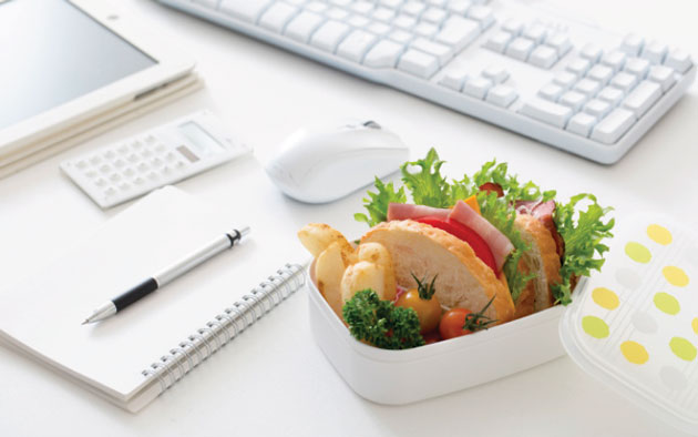 Sandwich in container on desk