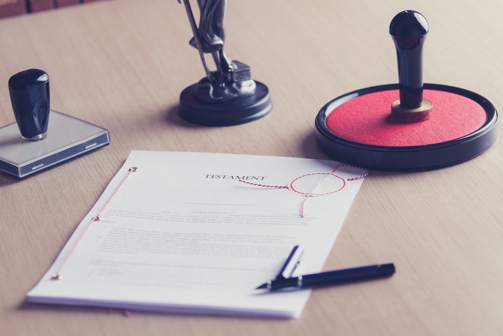 Signed power of attorney on estate planning attorney's desk